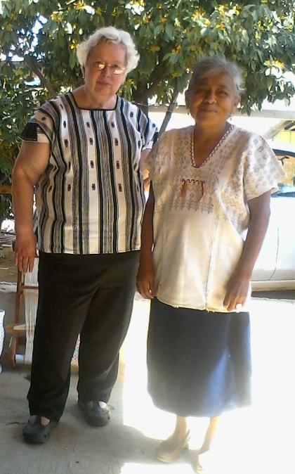 We both wear huipils, she made hers, it is beloved and authentic Zapotec.