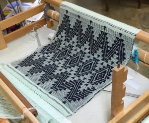 My zigzag with star motifs still on the loom